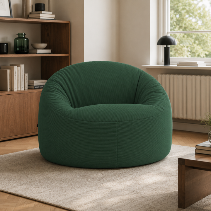 Pouf déhoussable 100 cm en velours côtelé vert foncé, forme ronde avec assise épaisse.