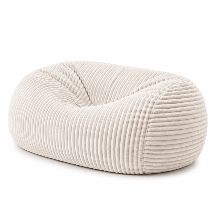 Pouf long géant déhoussable blanc cassé en fourrure côtelée