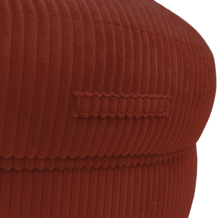 Gros plan sur la poignée du pouf XXL, tissu en velours côtelé.