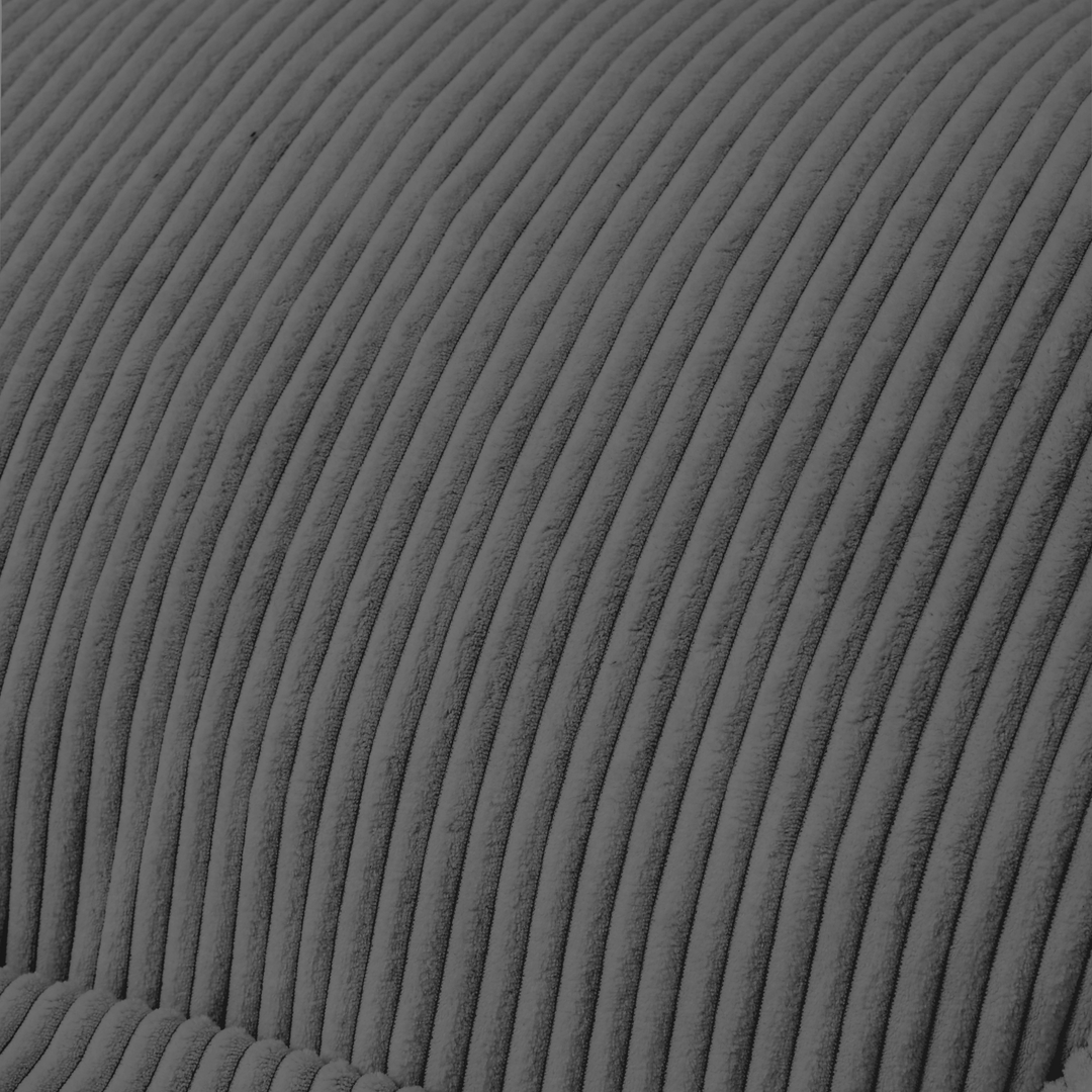Gros plan du tissu du pouf en velours côtelé gris foncé