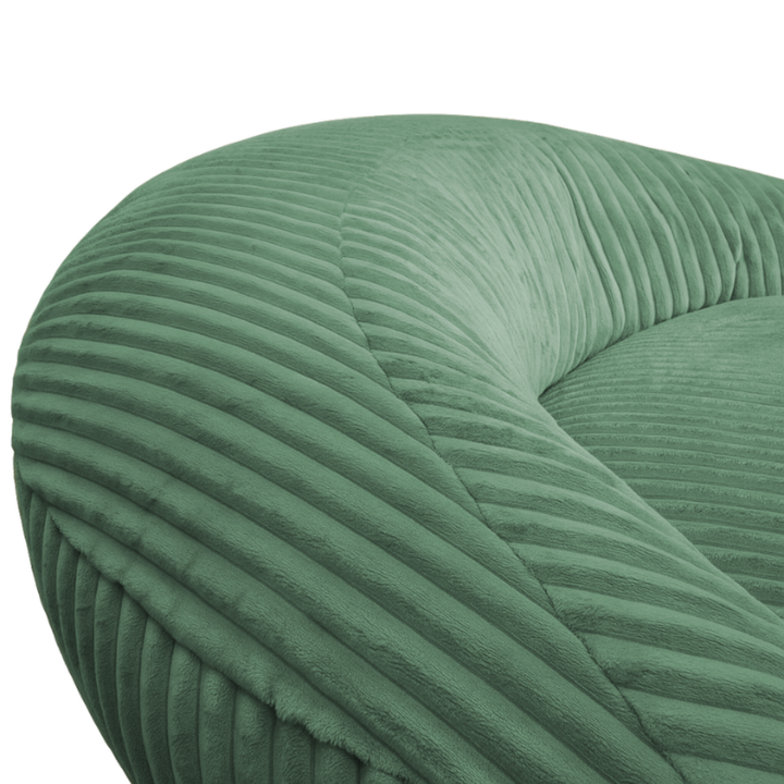 Gros plan sur le dossier arrondi du pouf XXL, tissu en velours côtelé.